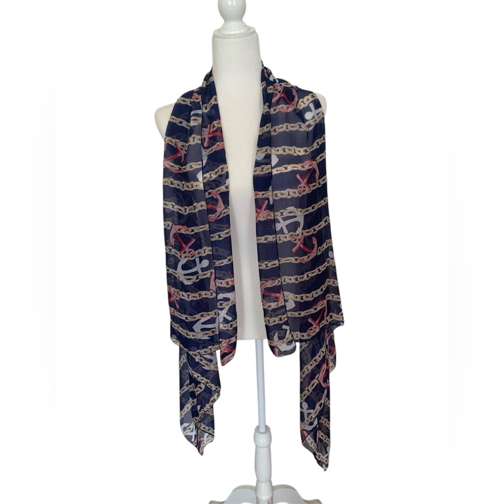 Sheer, navy blue, white, and pink nautical-print scarf or wrap.